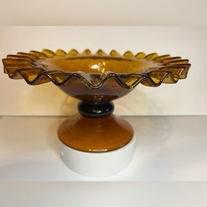 VINTAGE ~ AMBER GLASS DISH ON A PEDESTAL WITH RUFFLED EDGES.